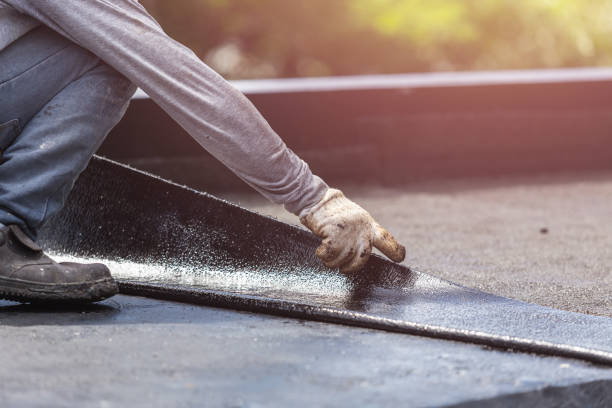 Professional Basement Waterproofing technician working in Perry, NY